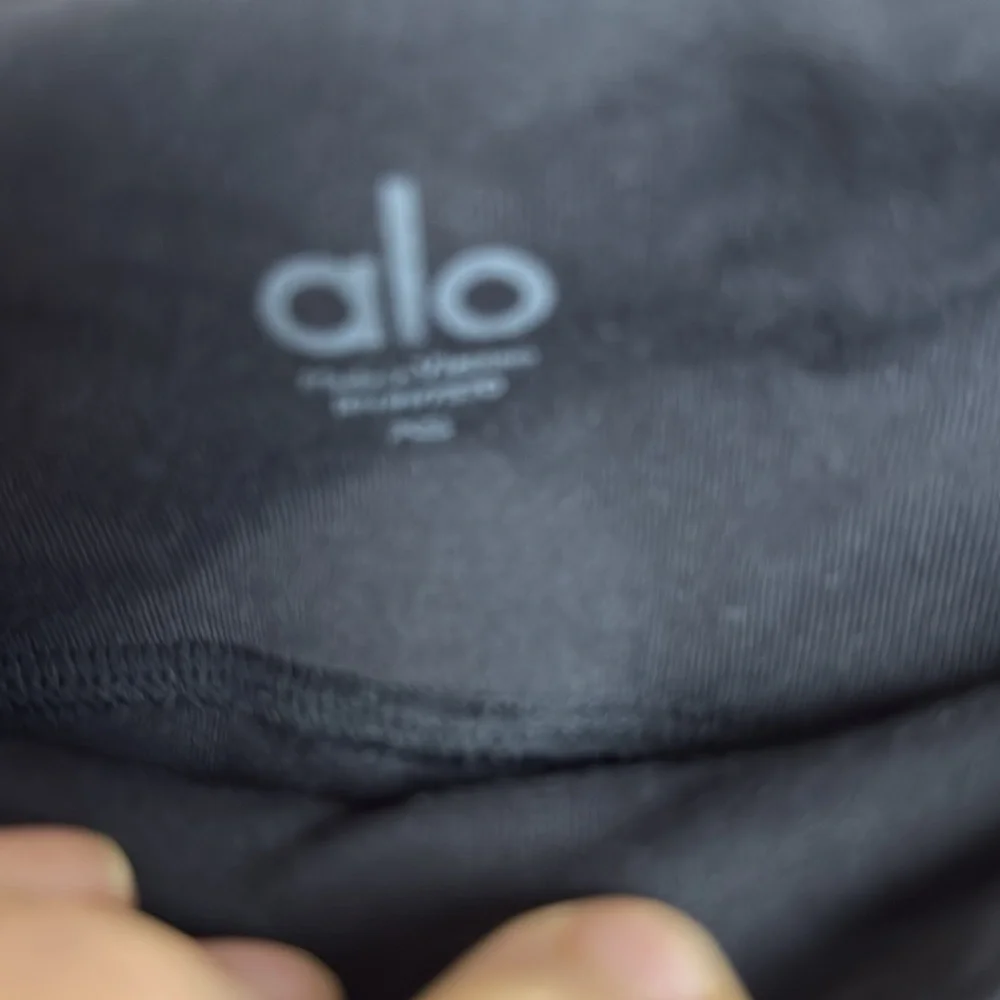 ALO Yoga Black and Olive green Leggings. Size XS